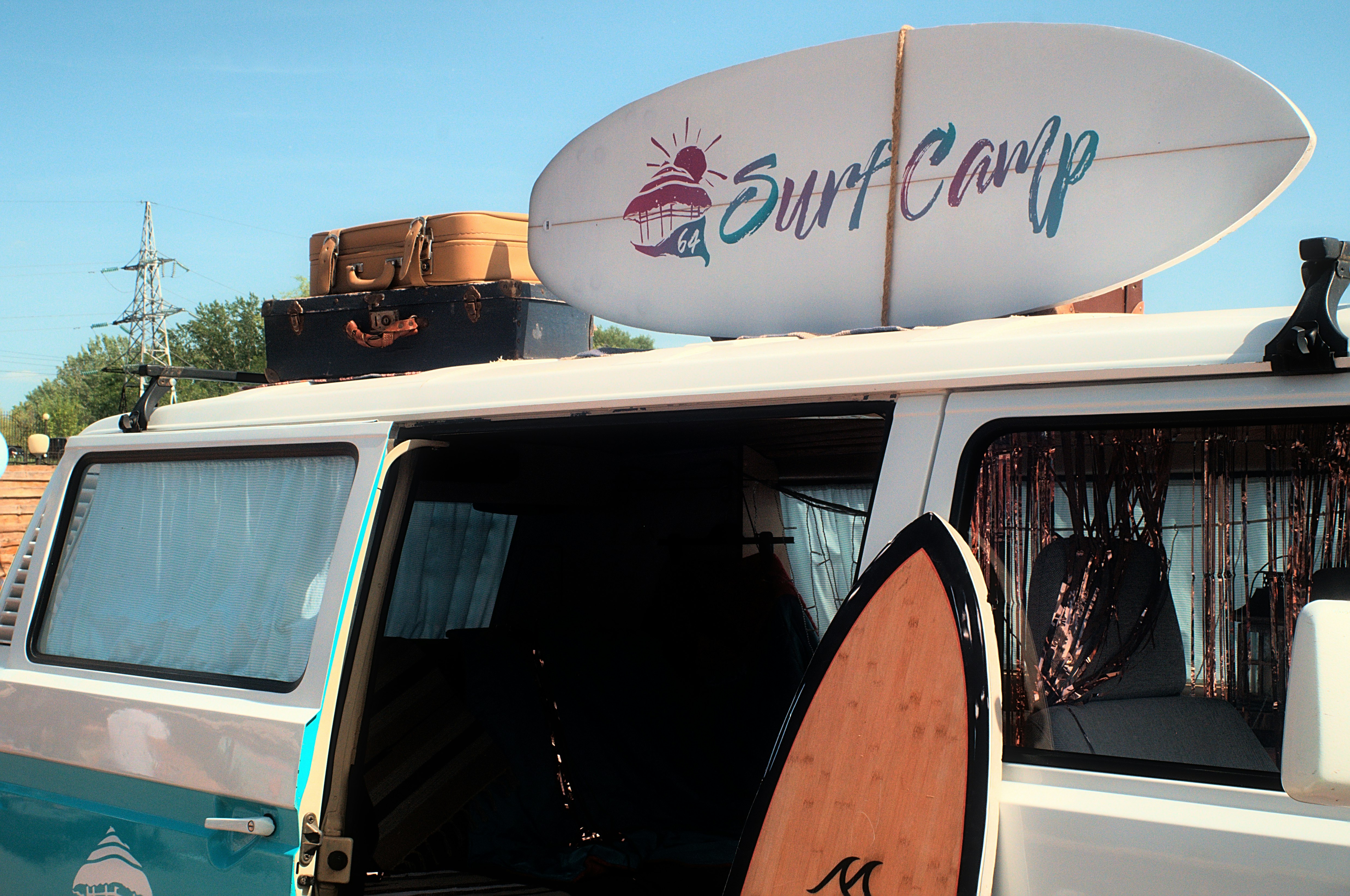 white and brown van under blue sky during daytime